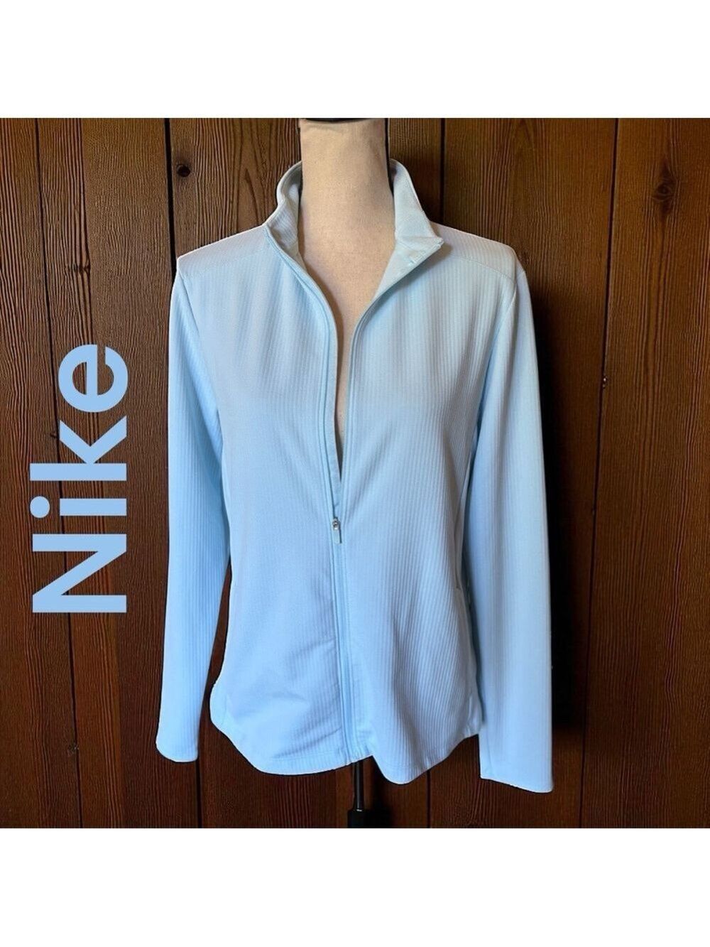 Nike-dry fit women’s jacket. Size medium. Light blue, full zip, 4 pockets. EUC!